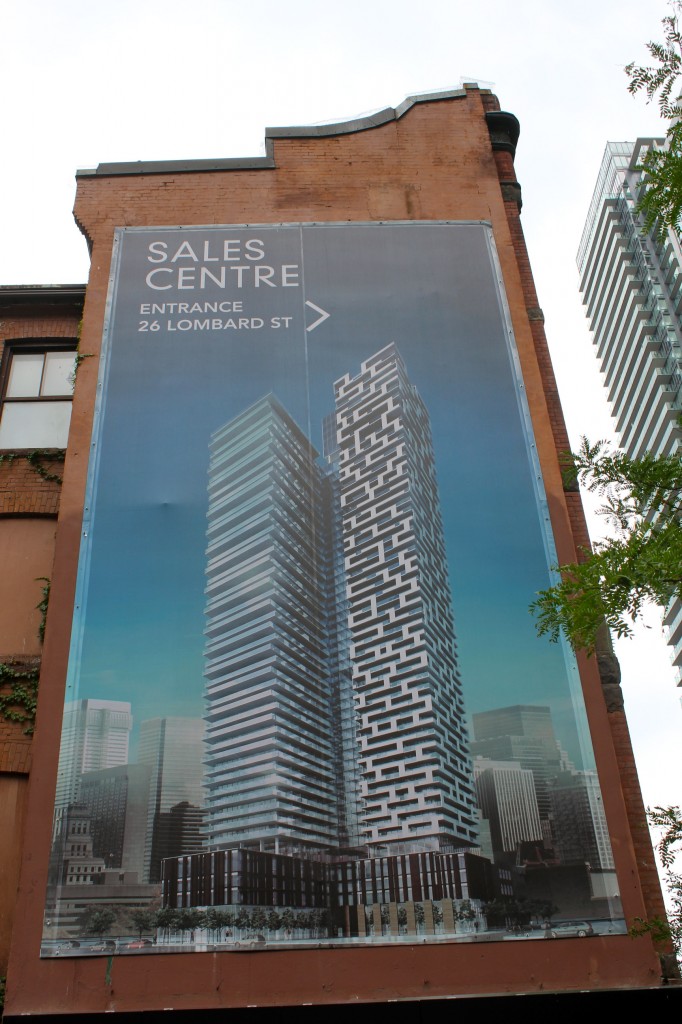 There's no mistaking where we are, this larger than life poster claims the area as Yonge and Rich's.