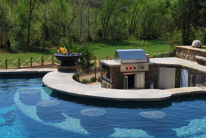 outdoor kitchen with swim-up bar